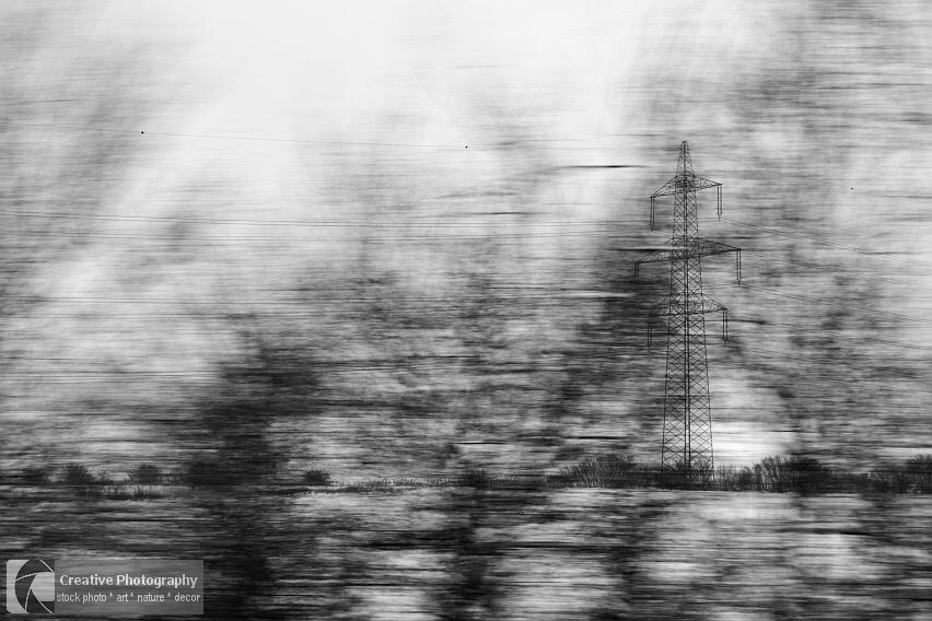 Electricity pylon in black and white photo