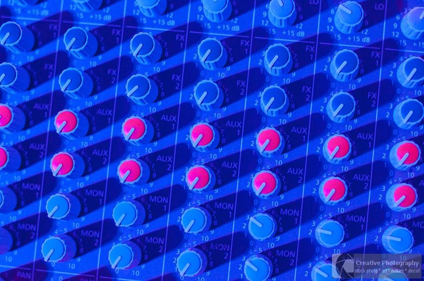 music mixer in blue light